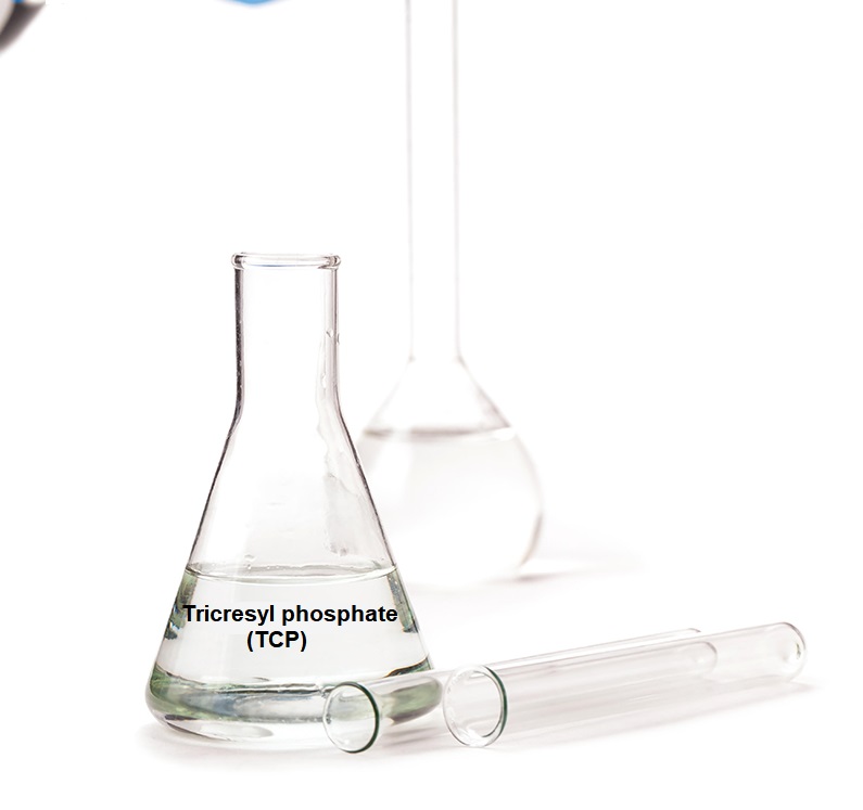 assistant pours reagent in the flask on a white background
